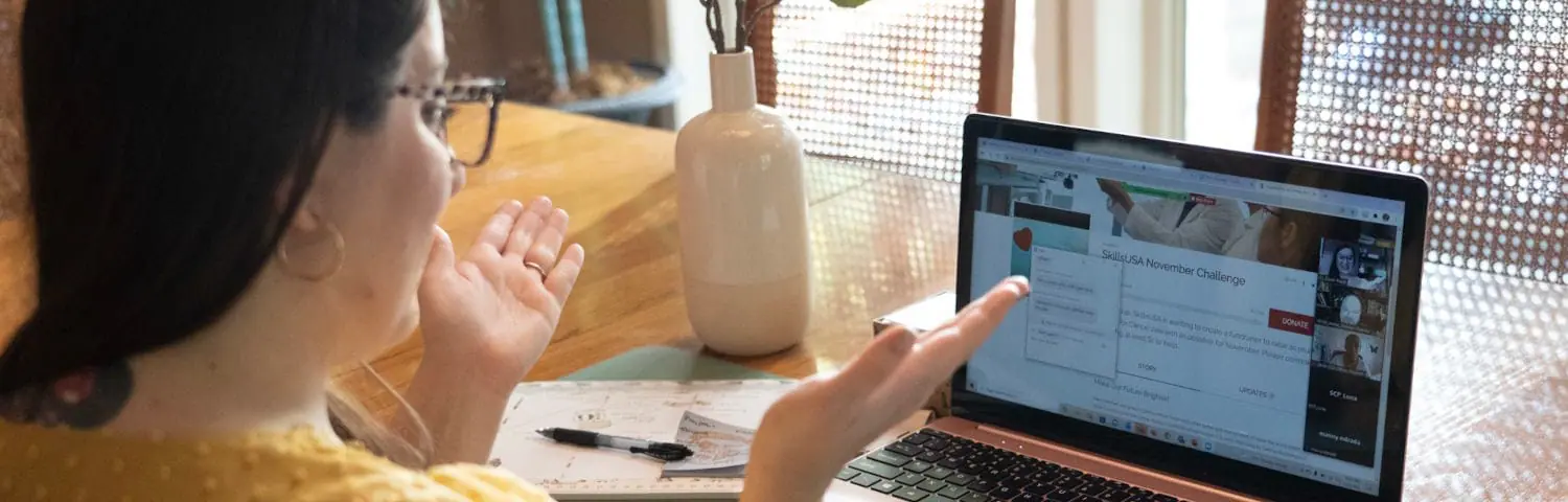 Student attending to an online class at home